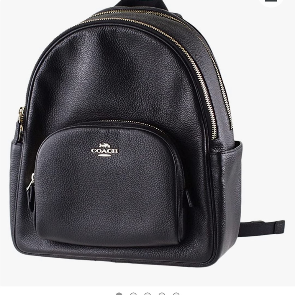 Black coach backpack. Size is in picture